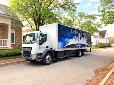 An electric Kenworth cabover delivery truck kitted out for Kittle's Furniture.