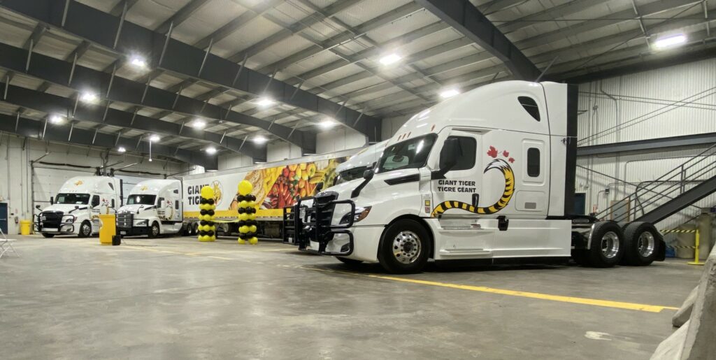 Tiger Trucking fleet in warehouse